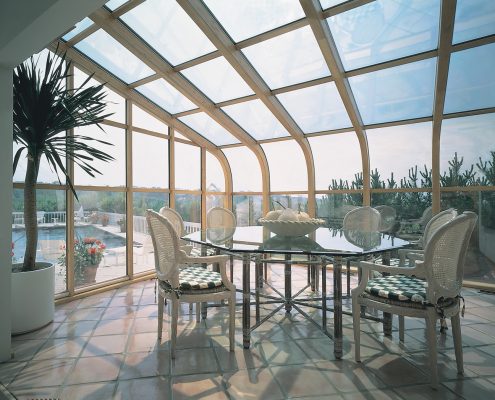 Curved Glass Roof Sunroom or Solarium with Wood Interior